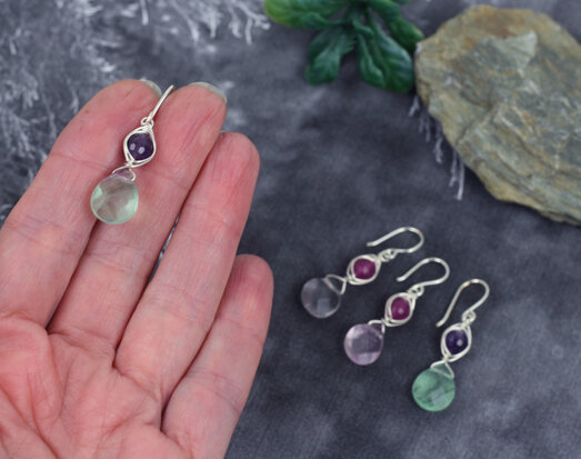 Sterling silver evil eye earrings with amethyste