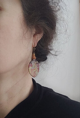 Lady with snake earrings
