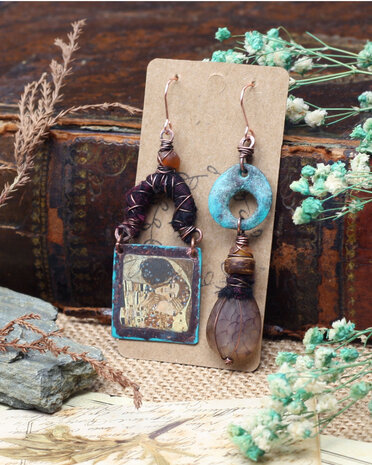 The Kiss mismatched bohemian earrings