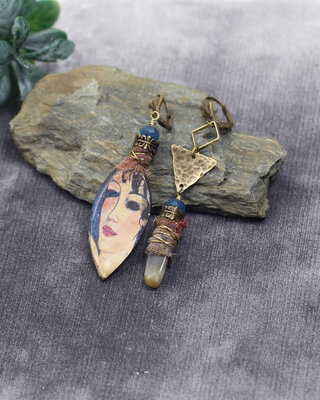 Woman face earrings